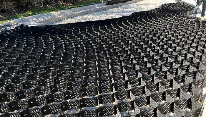 Close-up view of GEOWEB geocells used in parking lot base reinforcement